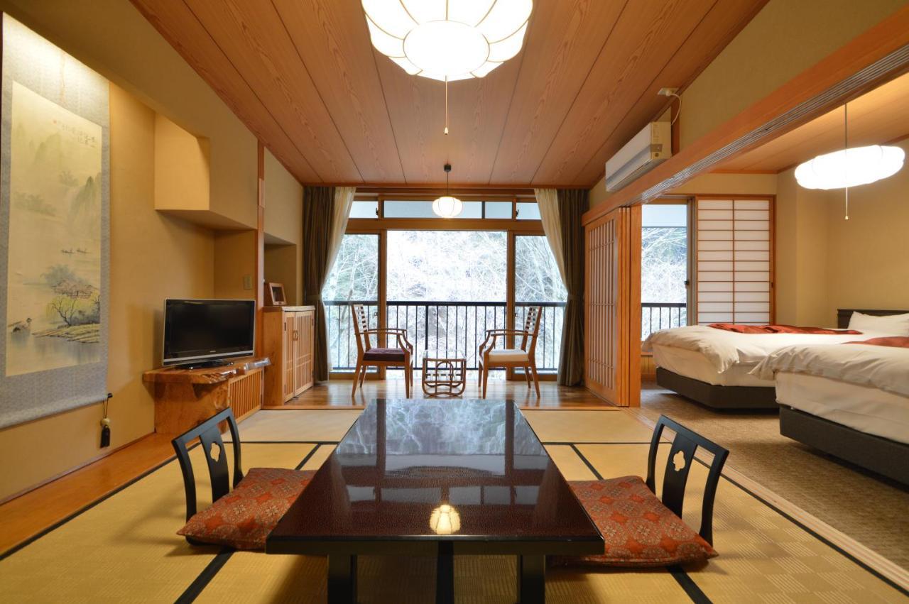 Kurokawa Onsen Oku no Yu Hotel Minamioguni Bagian luar foto